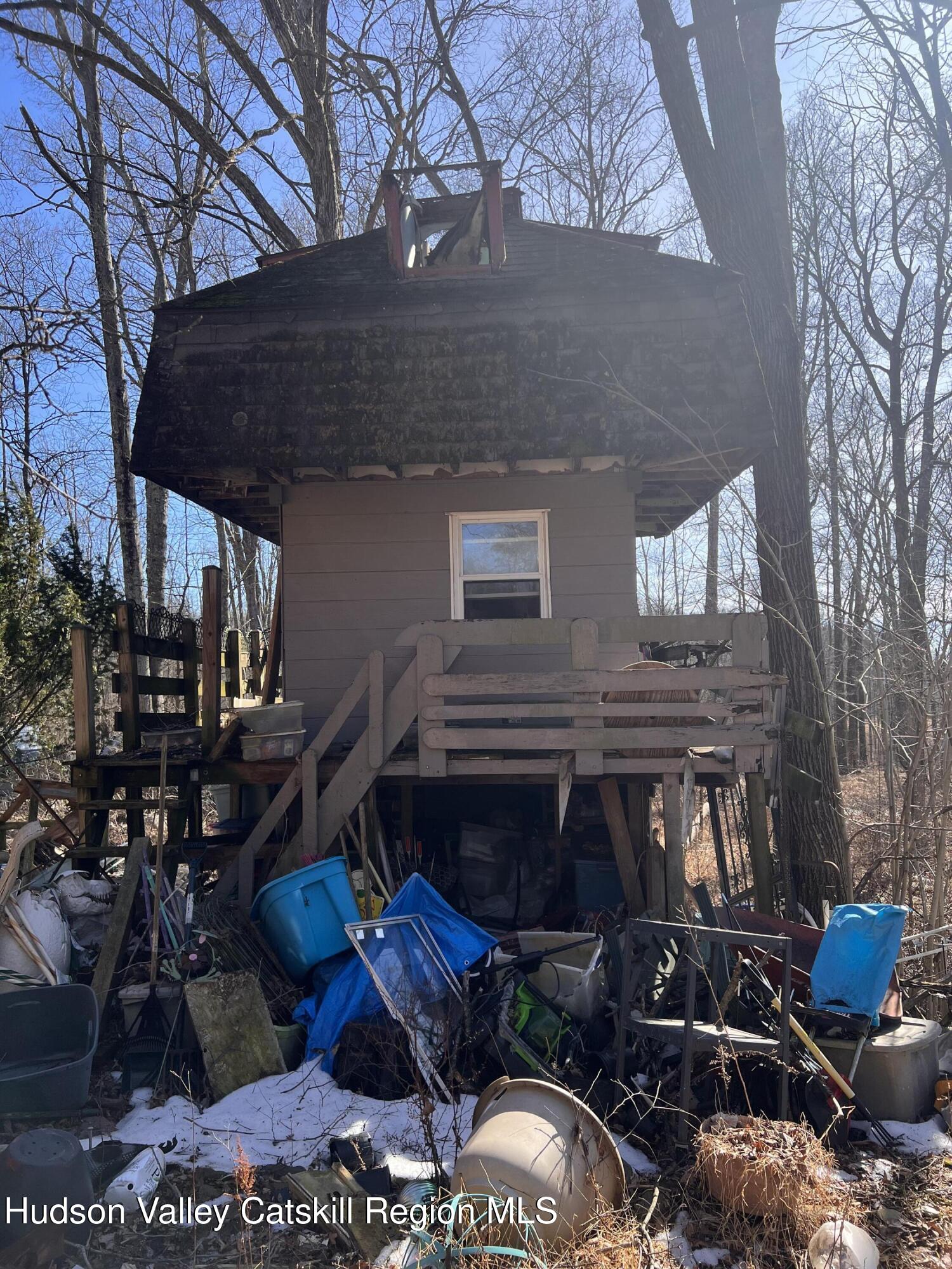2439 Bruynswick Road Wallkill, NY 12589 - Photo 6 of 10 a view of a house with backyard and sitting area