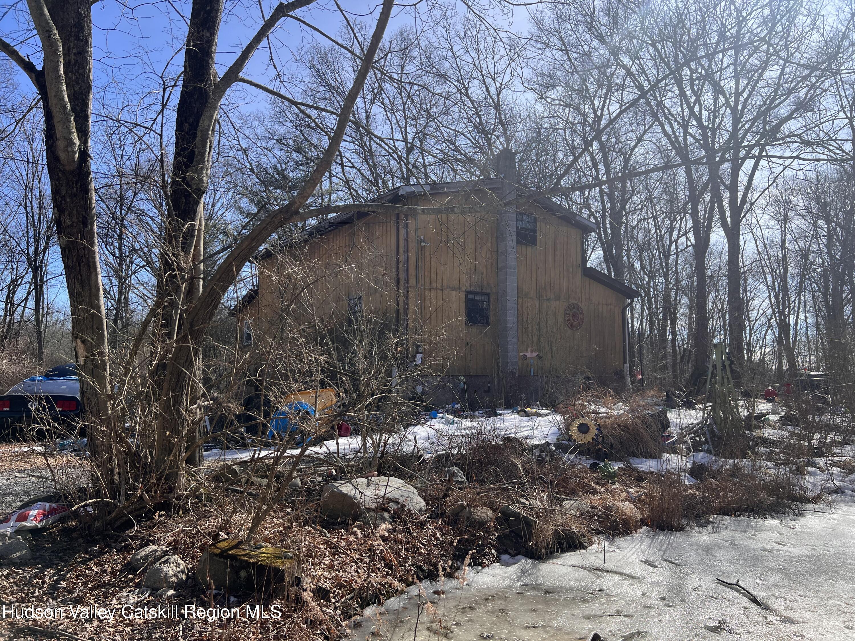 2439 Bruynswick Road Wallkill, NY 12589 - Photo 9 of 10 a backyard of a house with lots of green space