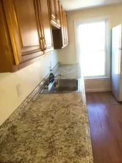 a room with a bed and a window