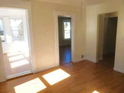 a view of an empty room and window