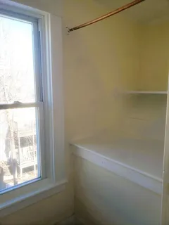 a view of a window in an empty room