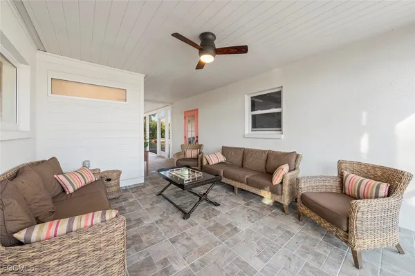 a living room with furniture and a couch