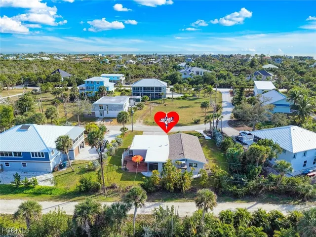 a view of a swimming pool with an outdoor seating