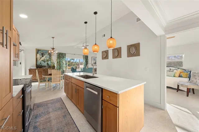 a kitchen that has a lot of cabinets in it