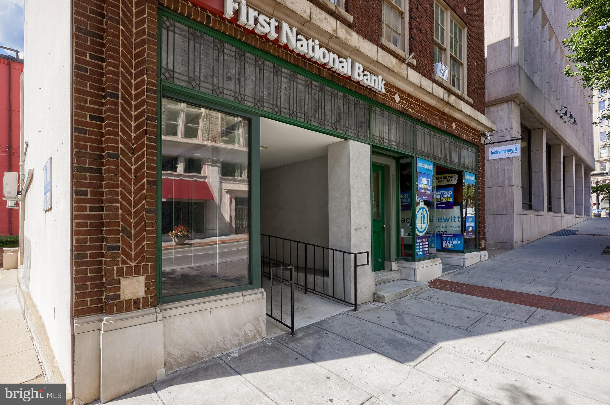 12 South Queen Street Lancaster, PA 17603 - Photo 22 of 58 a view of a building with a door and a window