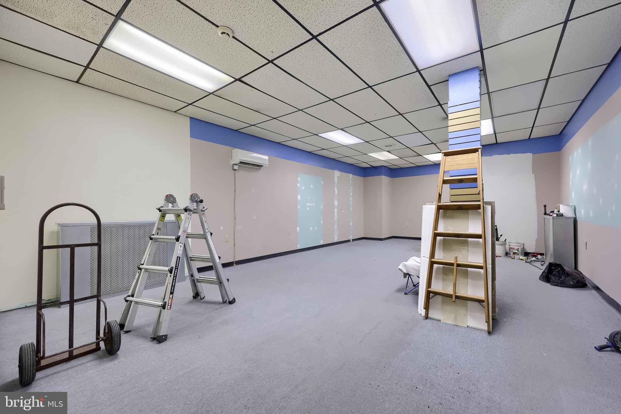 12 South Queen Street Lancaster, PA 17603 - Photo 25 of 58 a room with gym equipment and a table