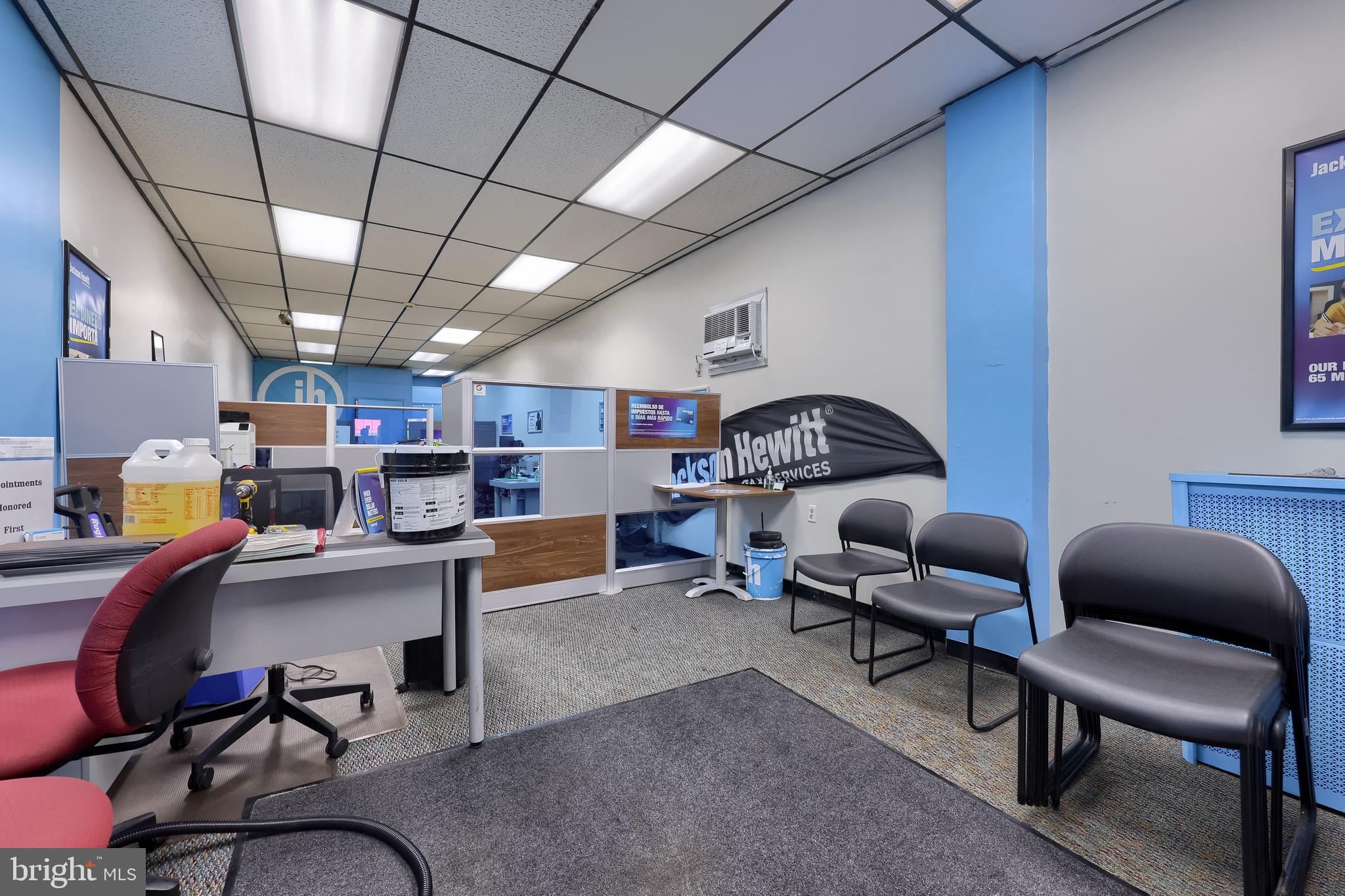 12 South Queen Street Lancaster, PA 17603 - Photo 29 of 58 a work room with furniture and a chandelier
