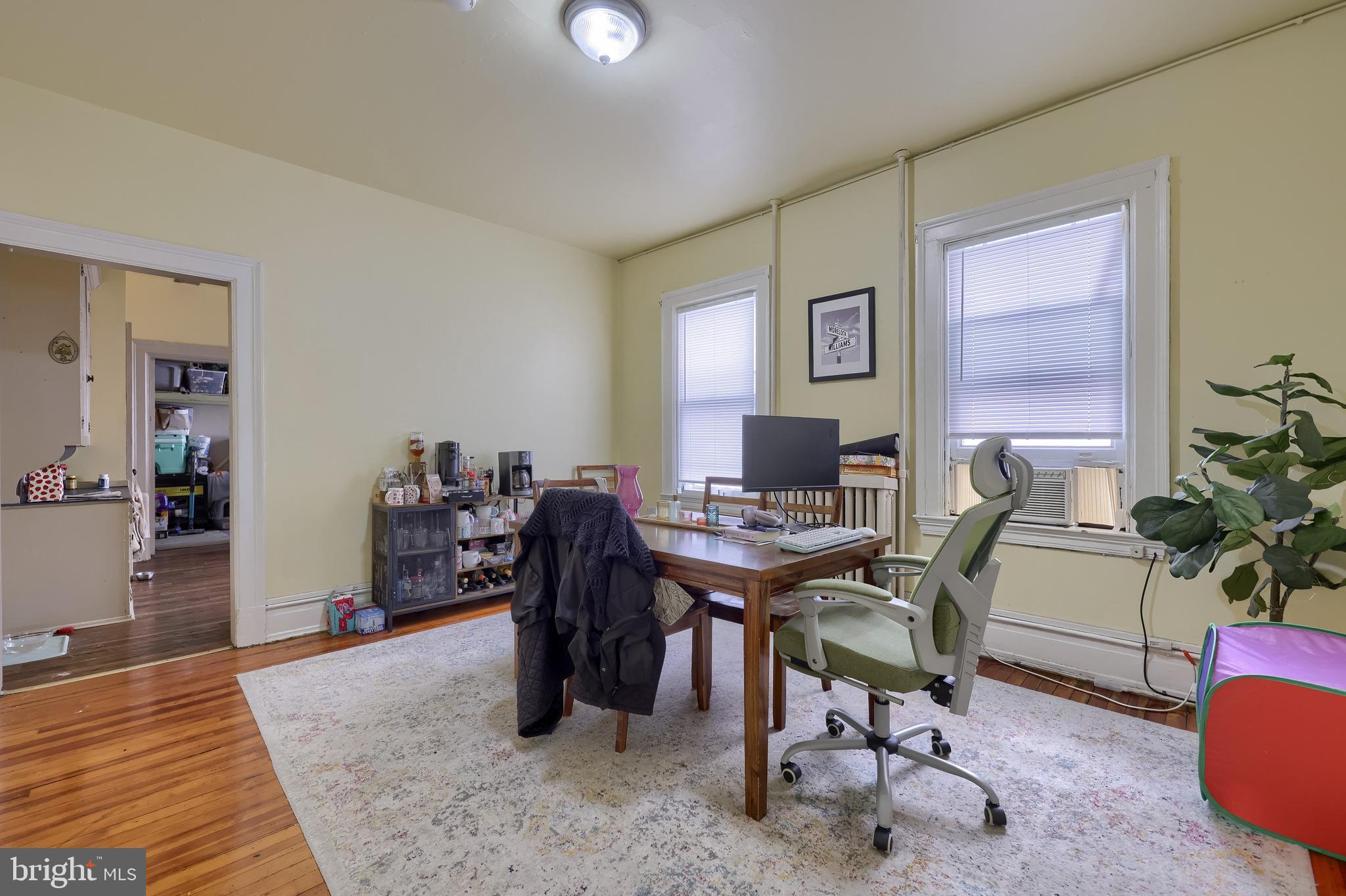 12 South Queen Street Lancaster, PA 17603 - Photo 38 of 58 a view of a workspace with furniture and a rug