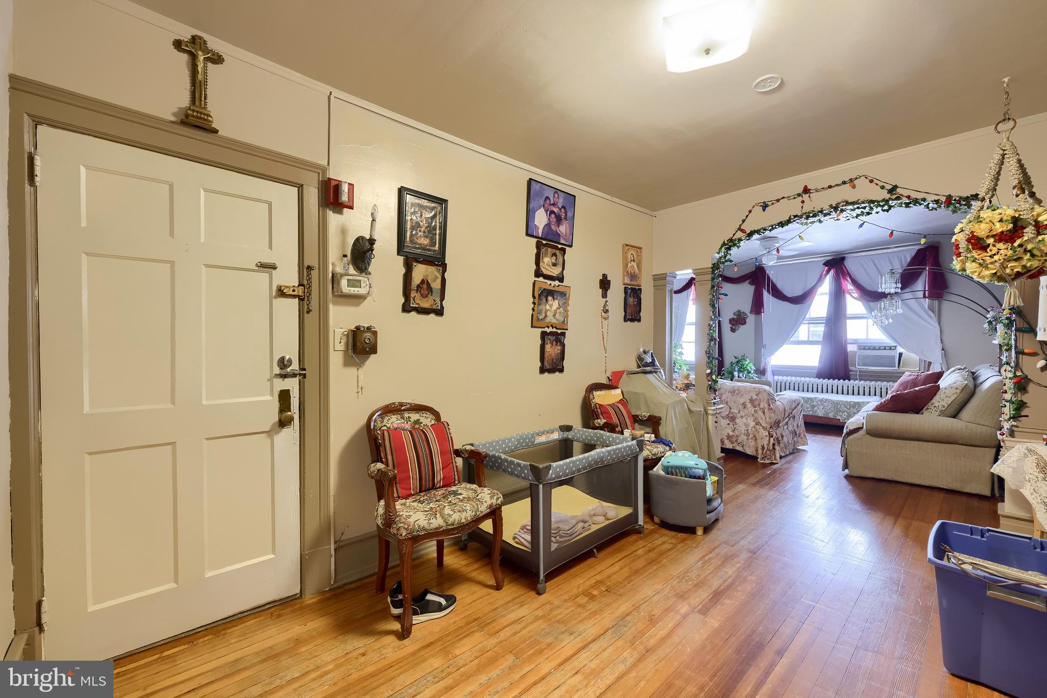 12 South Queen Street Lancaster, PA 17603 - Photo 46 of 58 a living room with furniture and wooden floor
