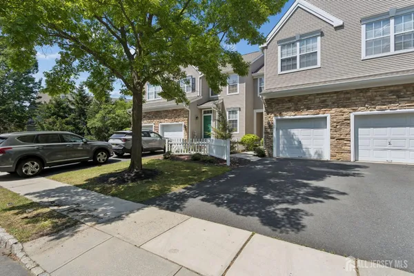 a view of a yard in front of a house