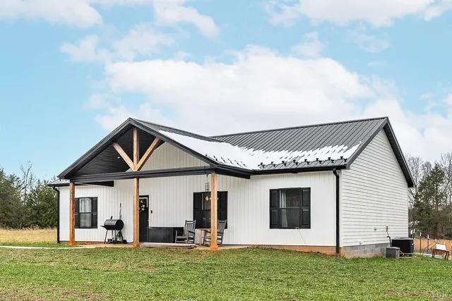 a front view of house with yard