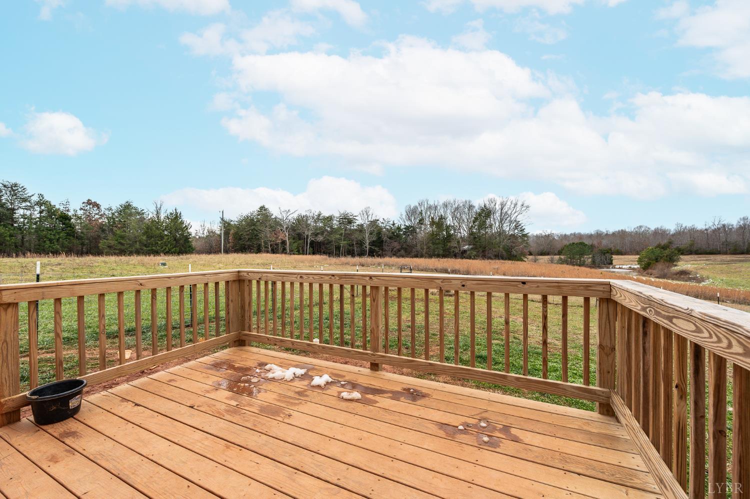 351 Down Creek Road Brookneal, VA 24528 - Photo 34 of 42 a view of balcony with wooden floor and fence