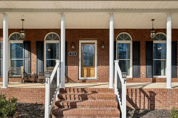 a view of a house with a porch