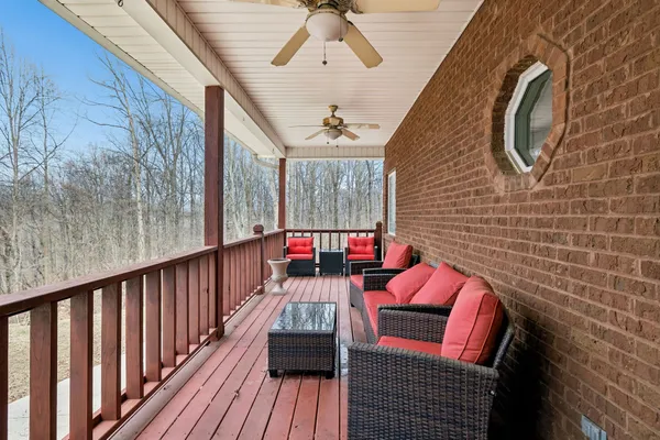 a balcony with wooden floor