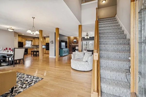 a lobby with furniture and rug