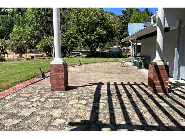 a view of a backyard with a garden
