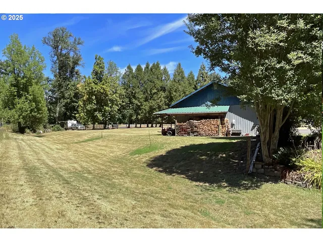 a view of swimming pool with trees
