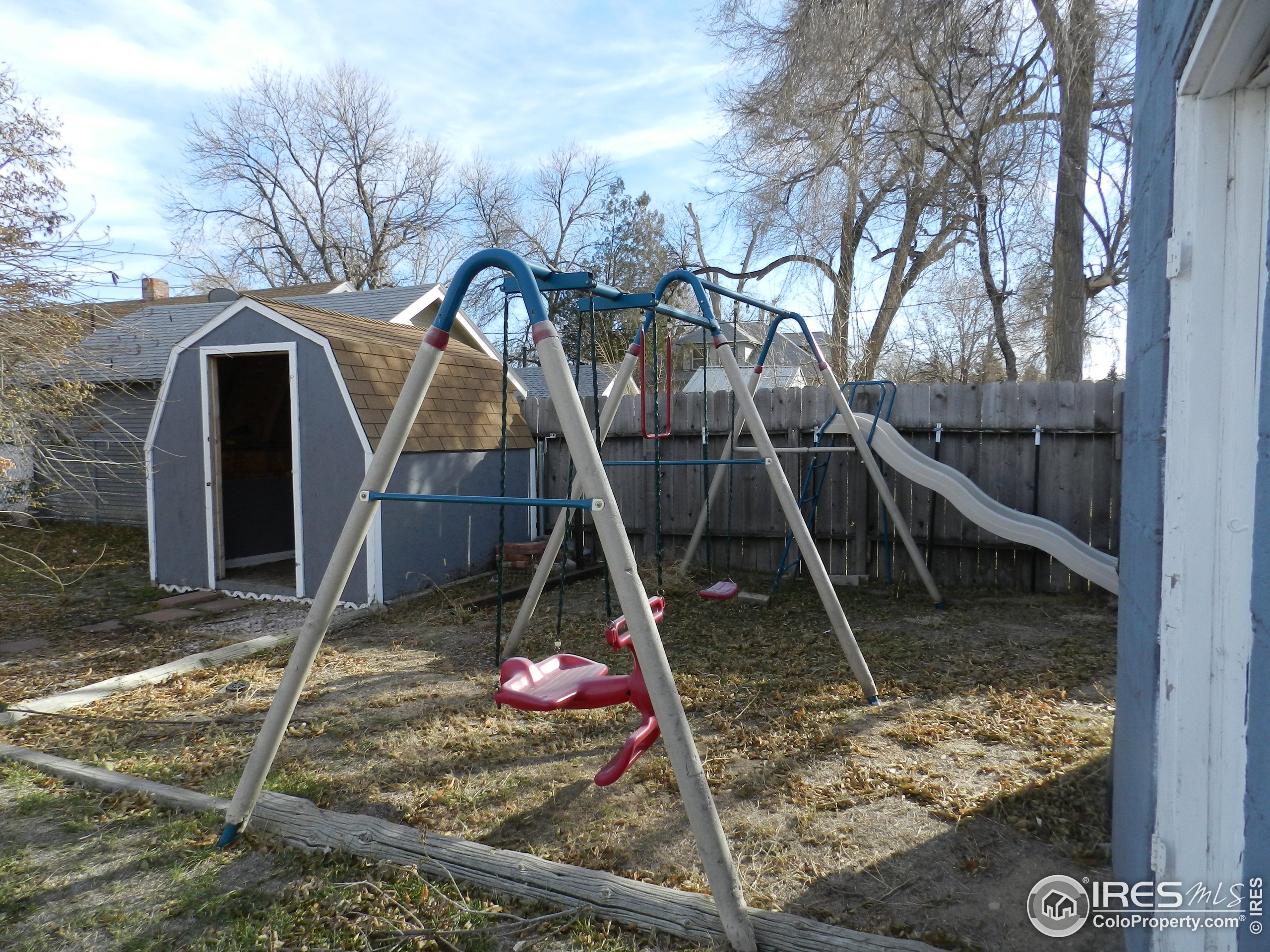 827 Prospect Street Fort Morgan, CO 80701 - Photo 14 of 19 a view of a slide