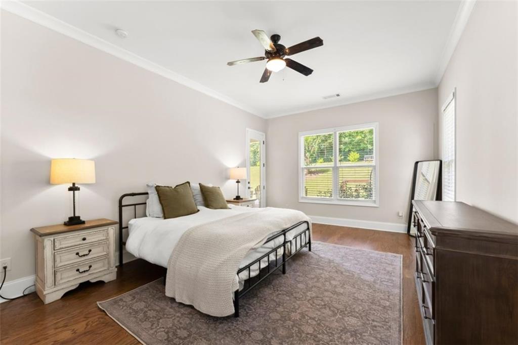 845 Walnut River Trail Hoschton, GA 30548 - Photo 16 of 74 a spacious bedroom with a bed and a window