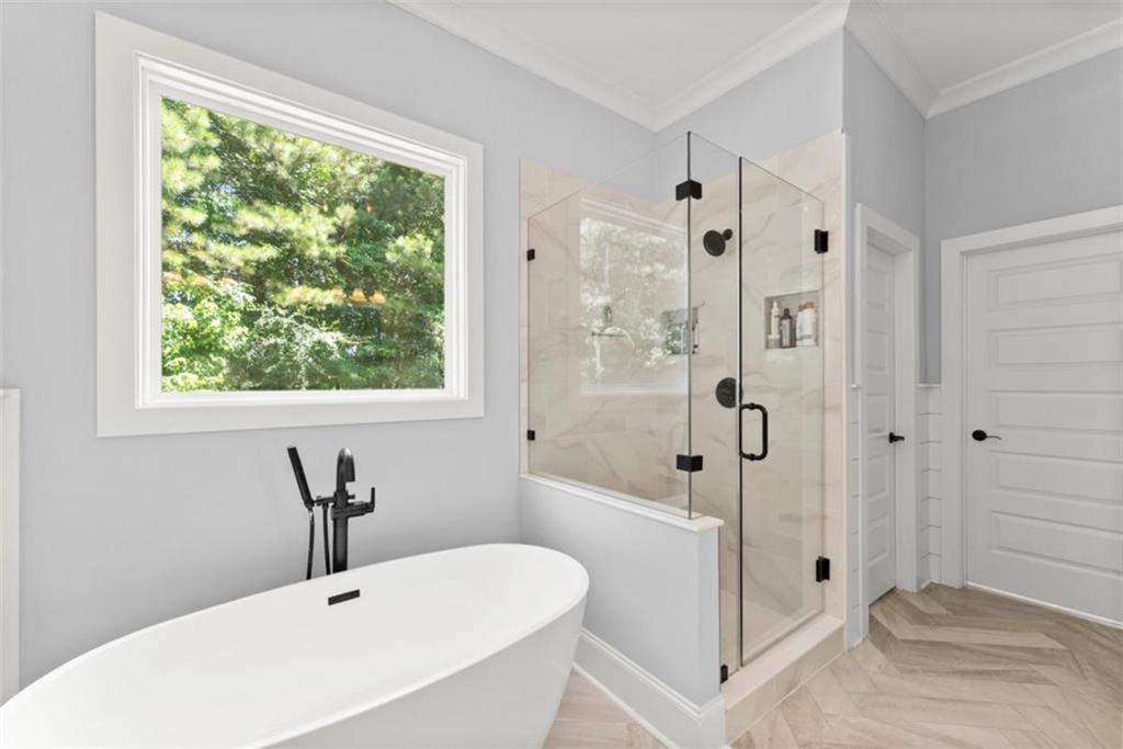 845 Walnut River Trail Hoschton, GA 30548 - Photo 19 of 74 a bathroom with a sink a toilet and shower