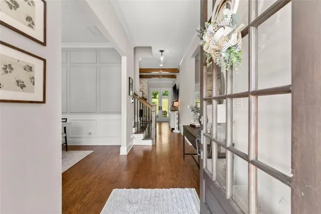 a living room with furniture fireplace and flat screen tv