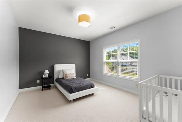 a front view of a house with swimming pool