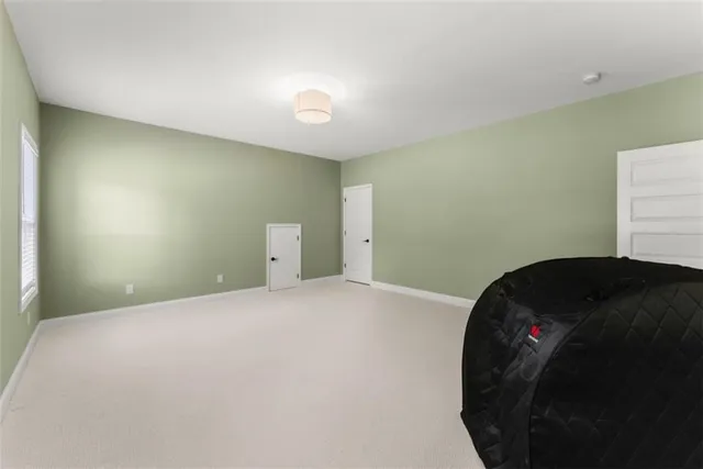 an aerial view of a house with yard patio and outdoor seating