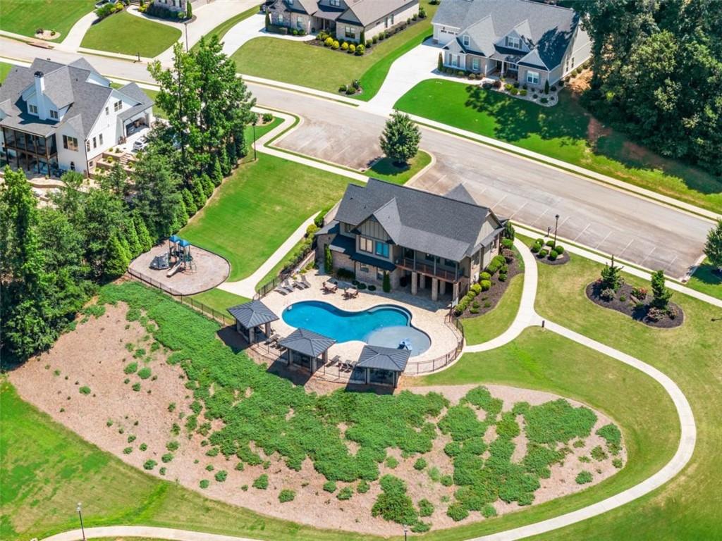 845 Walnut River Trail Hoschton, GA 30548 - Photo 70 of 74 an aerial view of a house with garden space and street view