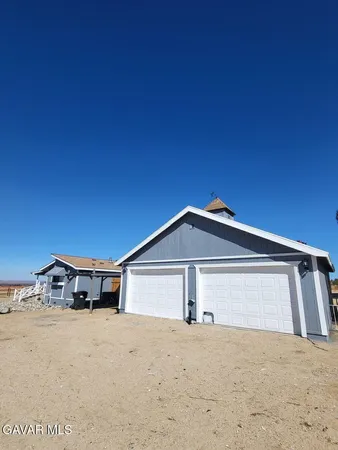 a house view with a outdoor space