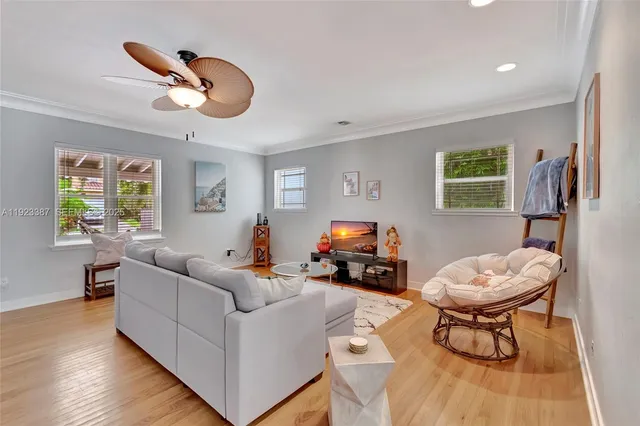 a living room with furniture and a window