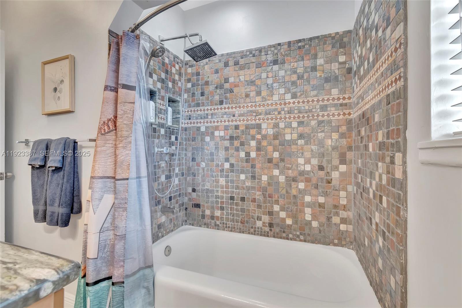 515 Southwest 9th Street Fort Lauderdale, FL 33315 - Photo 3 of 18 a bathroom with bathtub and shower