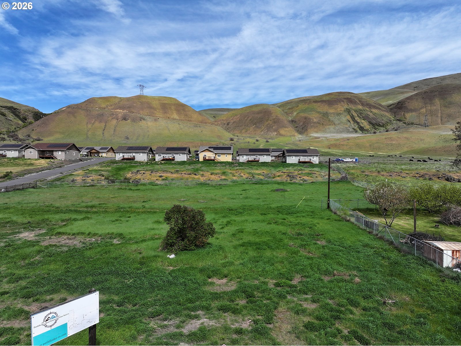 9251 State Route 14 Wishram, WA 98673 - Photo 29 of 30 a view of a lush green hillside and houses