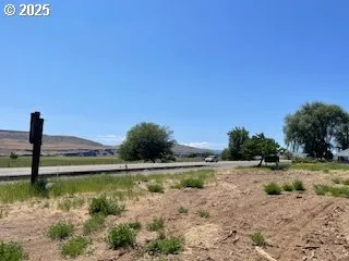 a view of a lake with a big yard