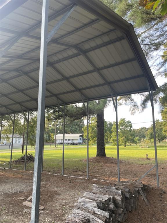 43-and44 Lisa Lane Streetman, TX 75859 - Photo 14 of 20 a view of a house with a backyard