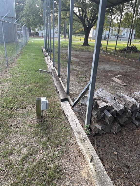 43-and44 Lisa Lane Streetman, TX 75859 - Photo 15 of 20 a view of a tiny house with a backyard