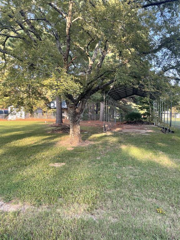 43-and44 Lisa Lane Streetman, TX 75859 - Photo 2 of 20 a view of yard with trees