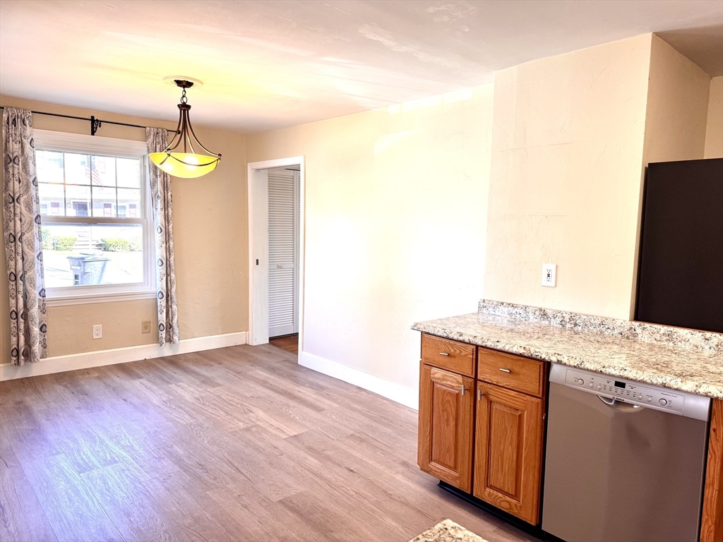 9 Redfield Road Cherry Valley, MA 01611 - Photo 22 of 35 a kitchen with stainless steel appliances granite countertop a stove a sink and a refrigerator