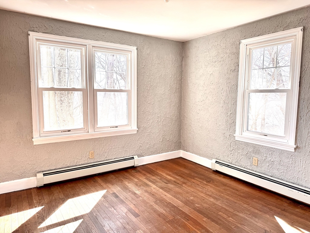 9 Redfield Road Cherry Valley, MA 01611 - Photo 24 of 35 a view of a room with wooden floor and a window