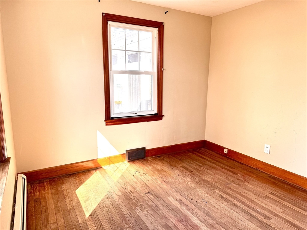 9 Redfield Road Cherry Valley, MA 01611 - Photo 28 of 35 a view of empty room with wooden floor and fan