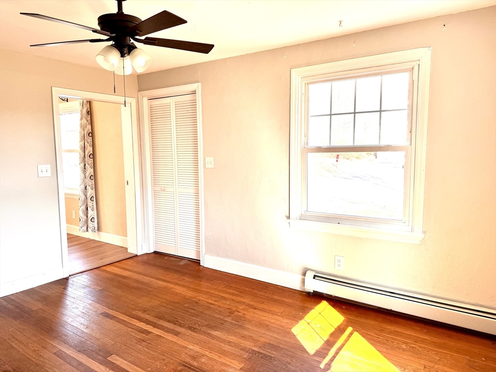 9 Redfield Road Cherry Valley, MA 01611 - Photo 31 of 35 a view of a room with a window and wooden floor