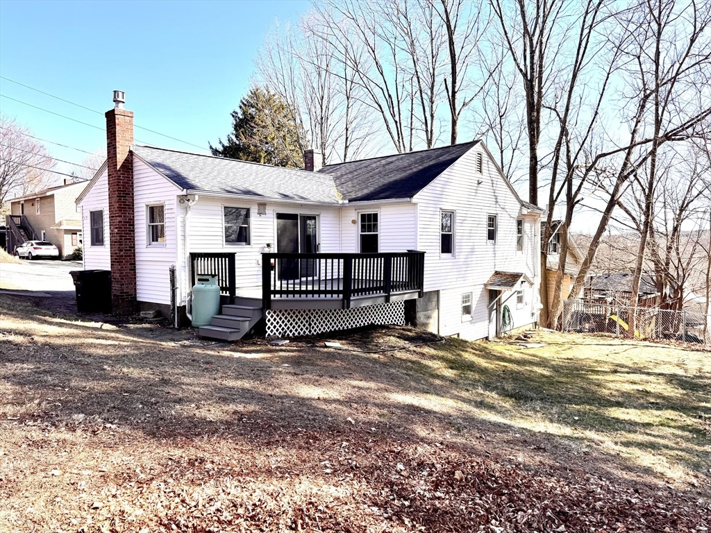 9 Redfield Road Cherry Valley, MA 01611 - Photo 7 of 35 a view of a house with a large tree in front of it