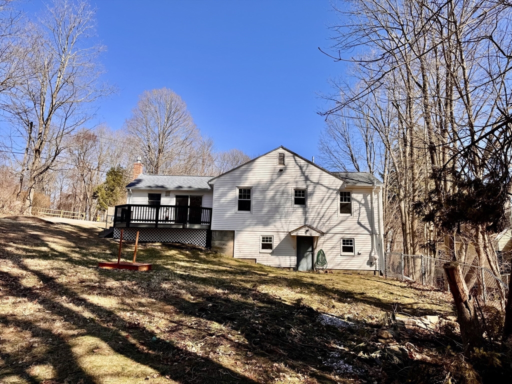 9 Redfield Road Cherry Valley, MA 01611 - Photo 9 of 35 a view of a house with a yard