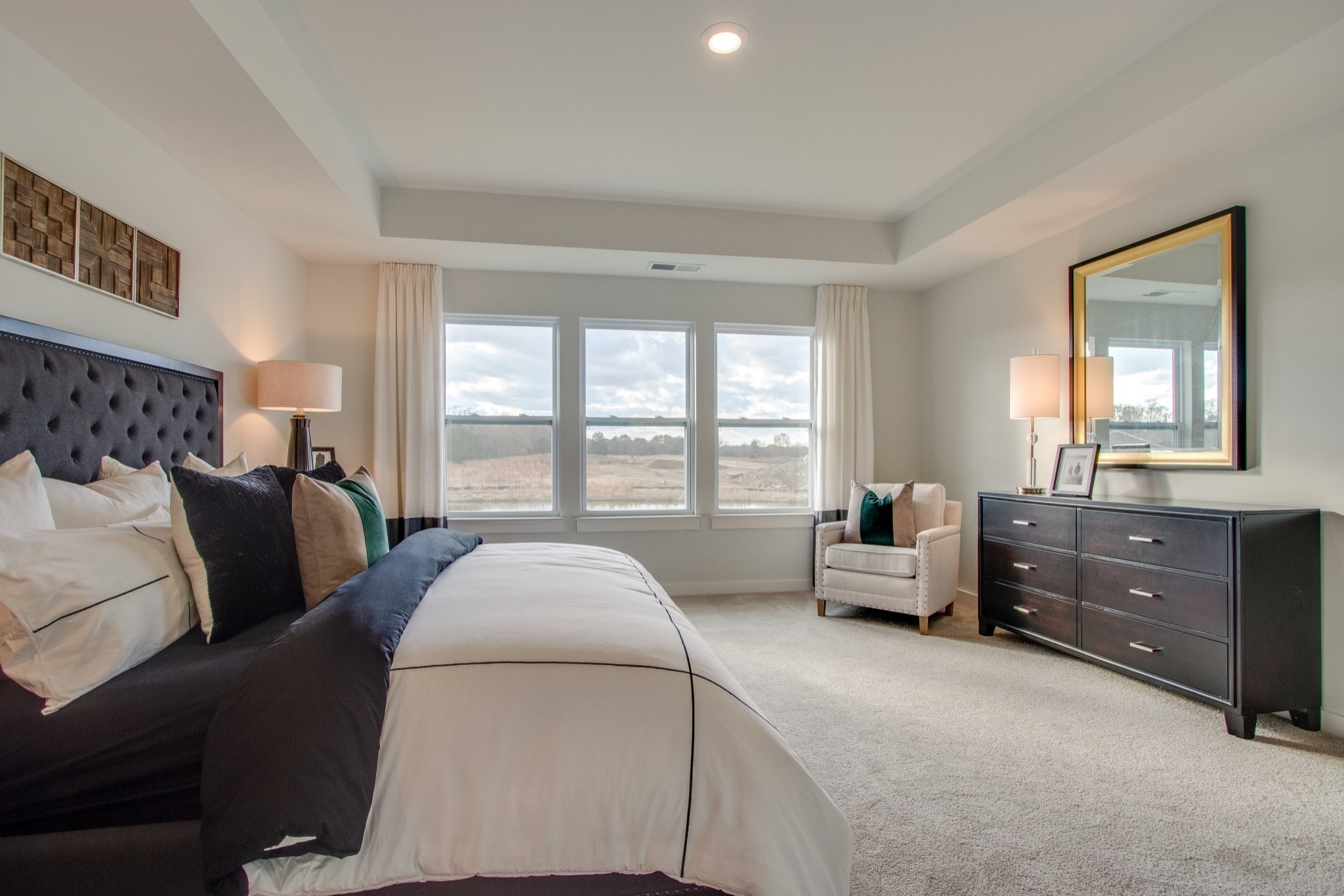 215 Goldfinch Rd Mount Mount Juliet, TN 37122 - Photo 13 of 18 a spacious bedroom with a bed and a couch