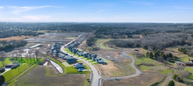215 Goldfinch Rd Mount Mount Juliet, TN 37122 - Photo 2 of 18 an aerial view of a house with a yard and lake