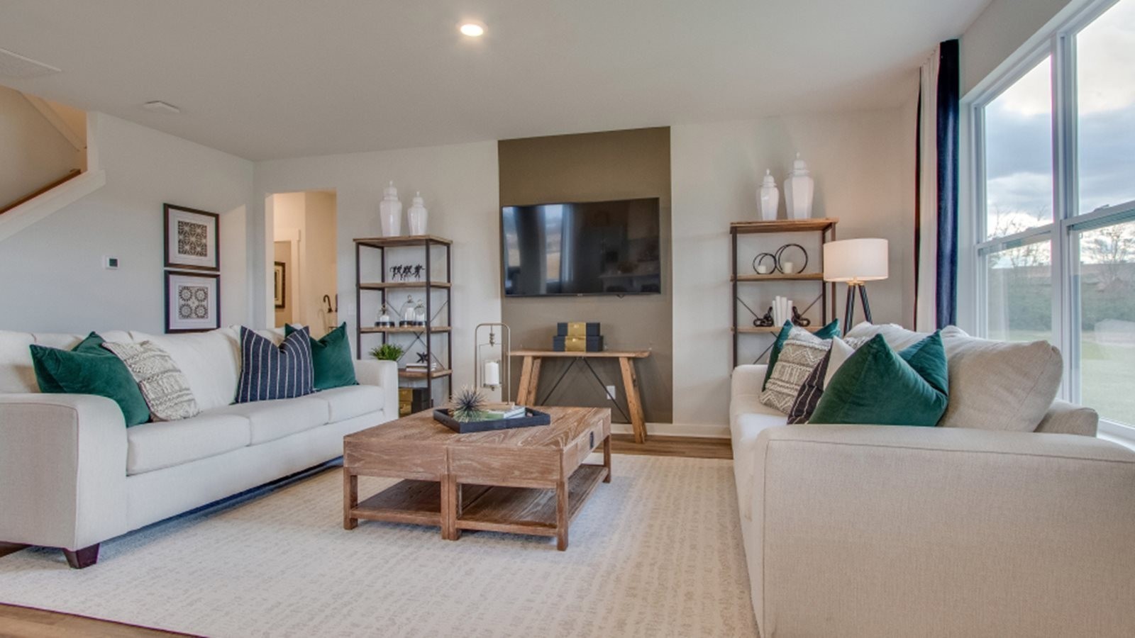 215 Goldfinch Rd Mount Mount Juliet, TN 37122 - Photo 9 of 18 a living room with furniture and a flat screen tv