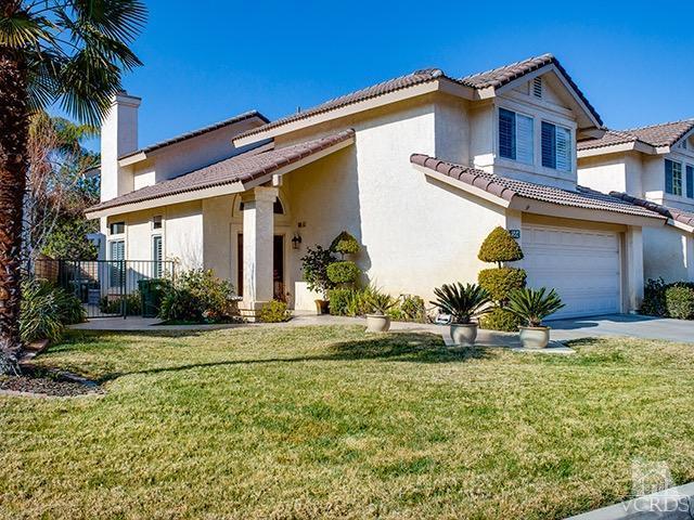 584 Fairfield Road Simi Valley, CA 93065 - Photo 1 of 26 a front view of a house with a yard
