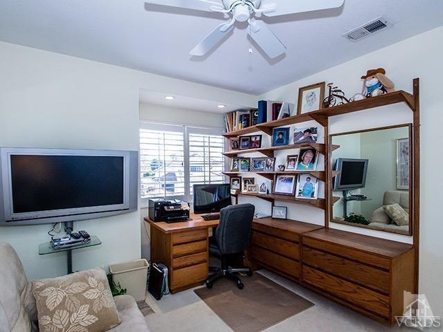 584 Fairfield Road Simi Valley, CA 93065 - Photo 18 of 26 a reading room with furniture and a flat screen tv