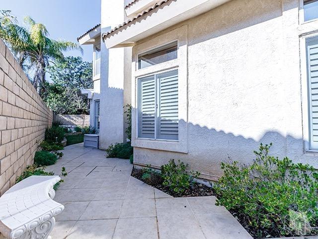 584 Fairfield Road Simi Valley, CA 93065 - Photo 24 of 26 a view of a pathway besides a house