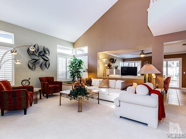 584 Fairfield Road Simi Valley, CA 93065 - Photo 4 of 26 a living room with furniture and a large window