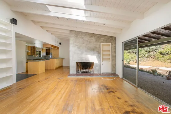 a view of a livingroom with a fireplace